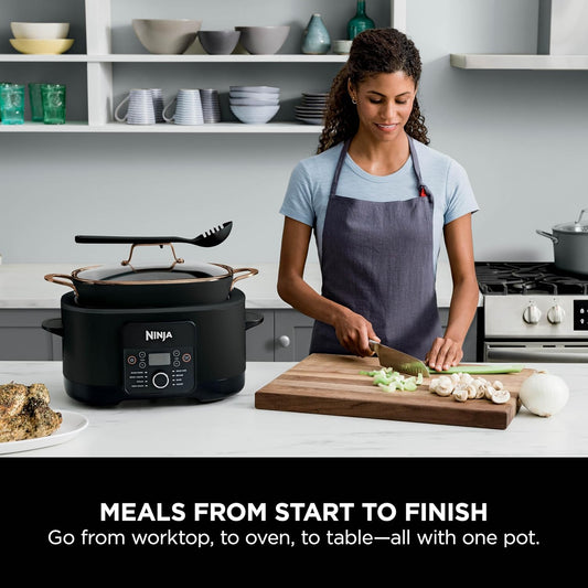 Ninja Foodi PossibleCooker 8-in-1 slow cooker in black and copper, 8L capacity, kitchen appliance with multiple cooking functions.