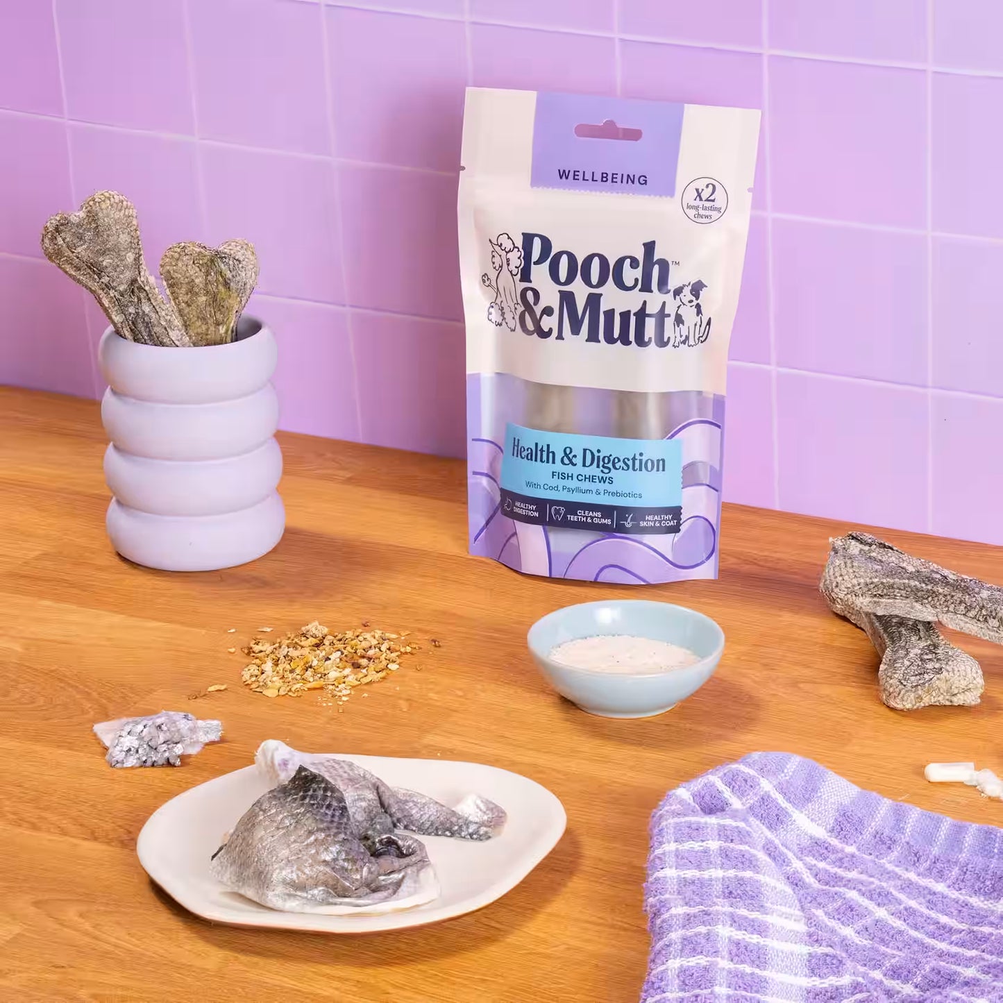Pooch & Mutt Fish Hide Dog Treats in a 90g package, featuring natural fish hide chews for healthy digestion and tasty rewards.